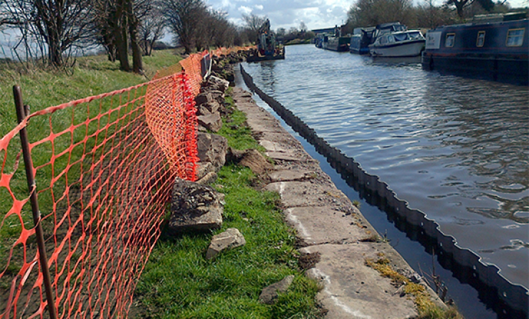 Trench sheets provide edge protection to canal